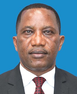 H.E. Dr. Bernard Yohana Kibesse - High Commissioner and Head of Mission